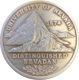 The Medal for Distinguished Nevadan. Silver, with a relief featuring rocky mountains.