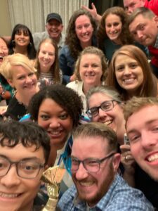 FAAN Selfie A smiling group crowds together for a selfie