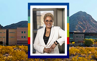 Headshot of Dr. DeRionne Pollard framed with NSHE institution colors. Background image: The Nevada state University campus seen at sunset
