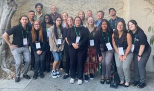Large Group4 A large group pf conference attendees pose for a picture in a courtyard