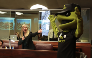 Assemblywoman Krasner pictured with the TMCC mascot.