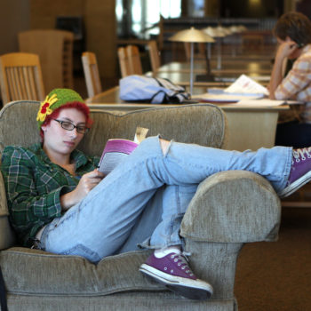 A student reads at the Western Nevada College library