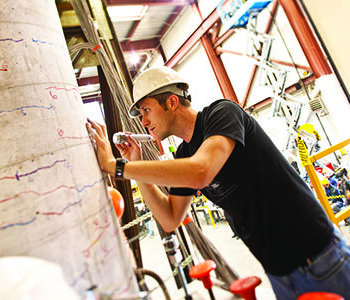 A student performs Earthquake Engineering Research