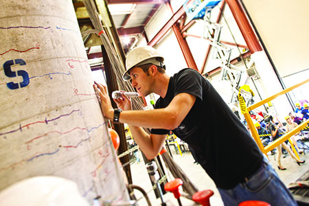 A student performs Earthquake Engineering Research