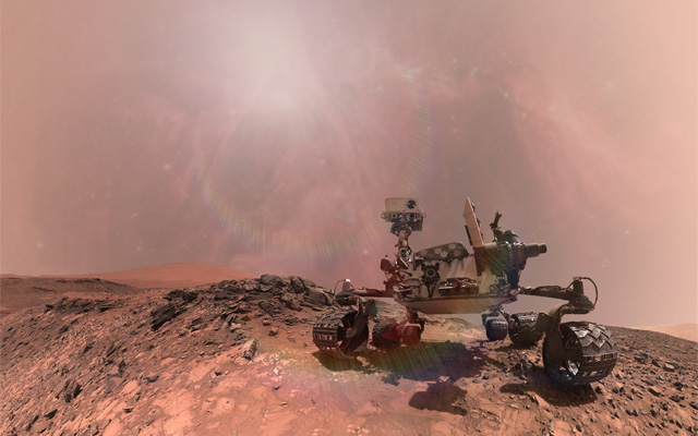 A robotic rover on the surface of mars, a lens flare and a red tinted starry sky in the background.